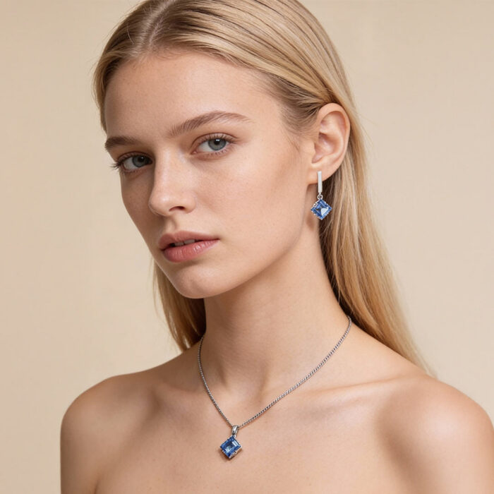 Kullast kõrvarõngad ja ripats topaasiga Komplekt: "Põhjala säde"